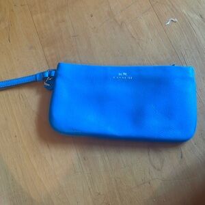 Used blue Coach clutch